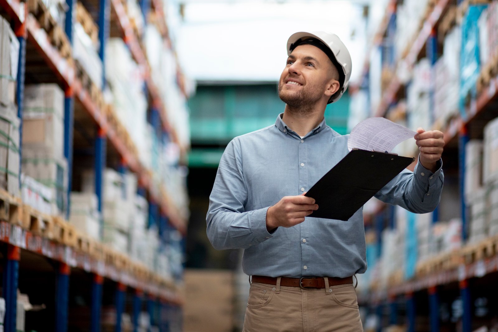 medium-shot-smiley-man-warehouse